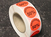 legatoria Bollini autoadesivi in tessuto con testo - Reduziert 50% ROSSO FLUORESCENTE, diametro 30mm, adesivo permanente, in rotolo.